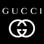 gucci-logo-brand-symbol-with-name-white-design-clothes-fashion-illustration-with-black-background-free-vector